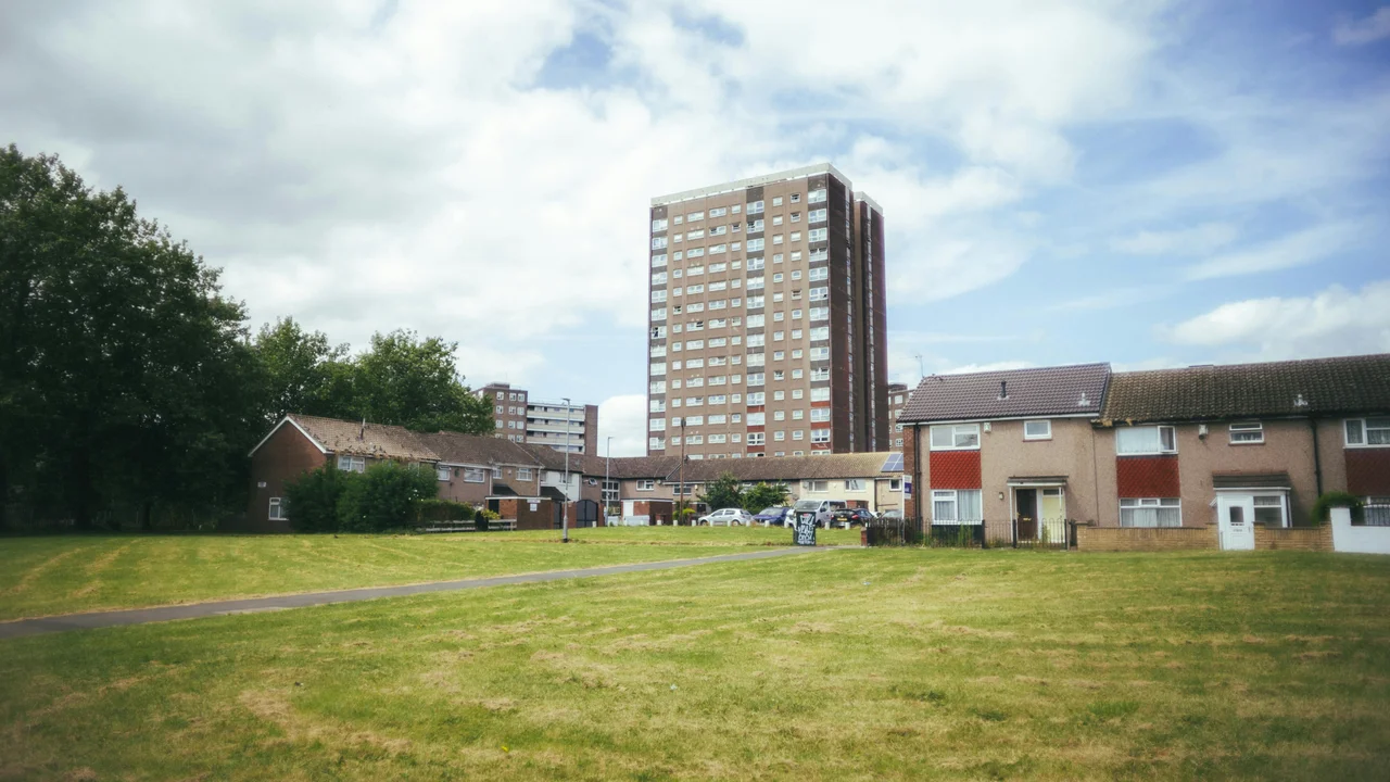 UK social housing block exterior, the property class Awaab's Law currently covers