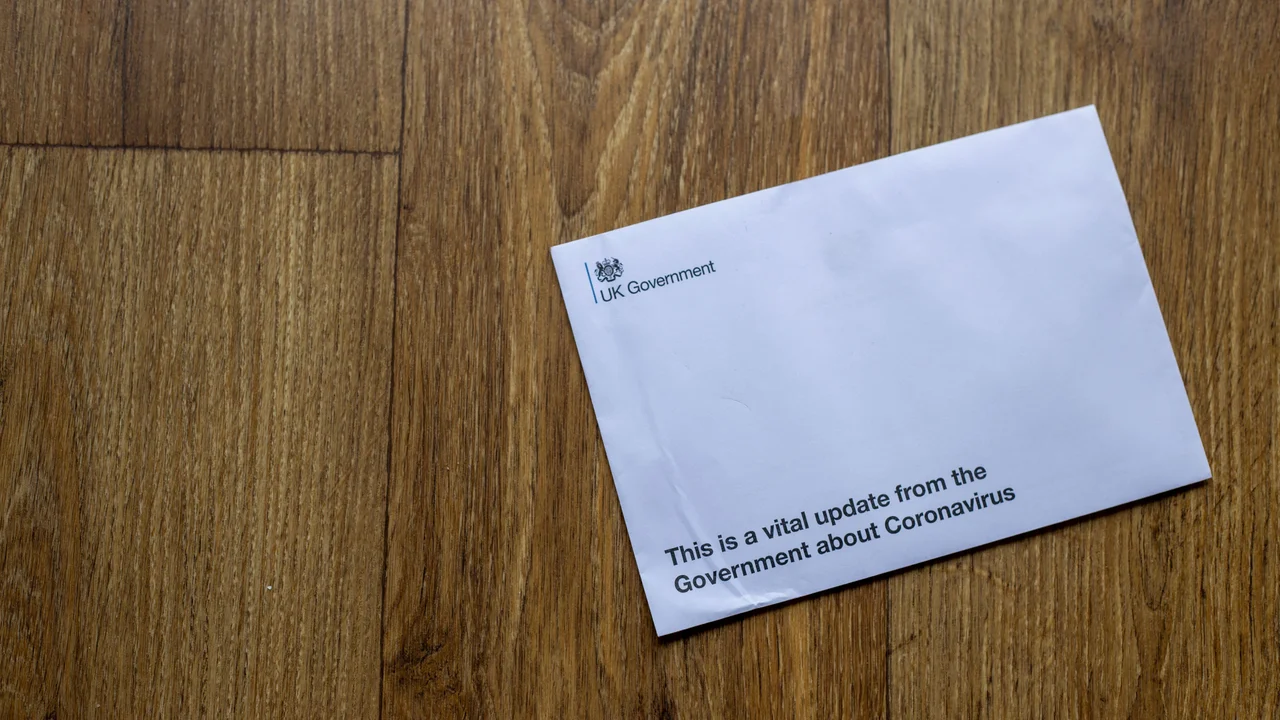 Official enforcement letter on doormat, regulatory penalty notice